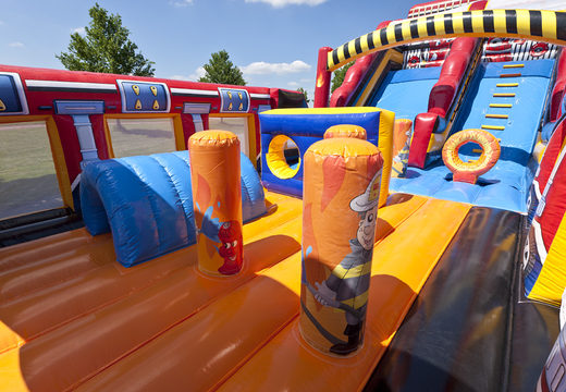 Order an inflatable mega slide in the Fire Brigade World theme with 3D obstacles for kids. Buy inflatable slides now online at JB Inflatables UK