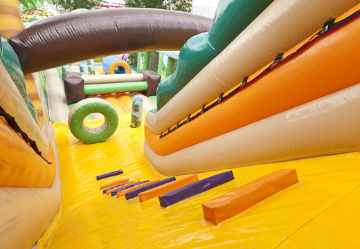 Jungle World slide XL with 3D obstacles for children. Buy inflatable slides now online at JB Inflatables UK