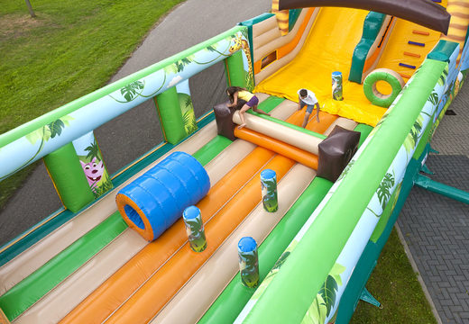 Order mega inflatable slide in Jungle World theme with 3D obstacles for kids. Buy inflatable slides now online at JB Inflatables UK