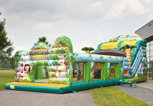 Buy an inflatable jungle world themed extra wide slide with 3D obstacles for kids. Order inflatable slides now online at JB Inflatables UK