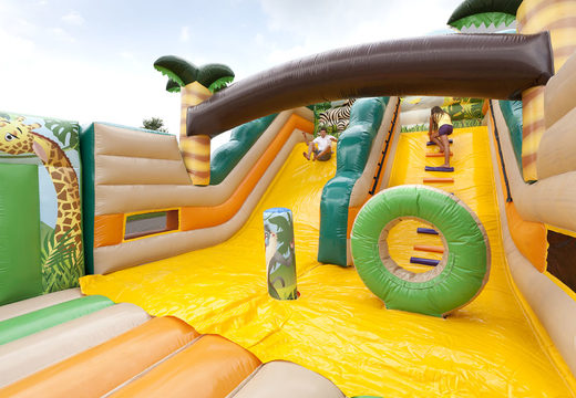 Order Inflatable Jungle World slide XL with 3D obstacles for children. Buy inflatable slides now online at JB Inflatables UK