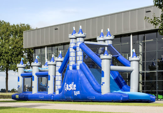 Buy a unique 17 meter wide castle themed obstacle course with 7 game elements and colorful objects for kids. Order inflatable obstacle courses now online at JB Inflatables UK