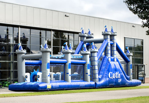 Order a 17 meter wide unique obstacle course in a castle theme with 7 game elements and colorful objects for children. Buy inflatable obstacle courses online now at JB Inflatables UK