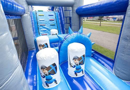 Get your unique 17m wide castle themed obstacle course with 7 game elements and colorful objects now for kids. Order inflatable obstacle courses at JB Inflatables UK