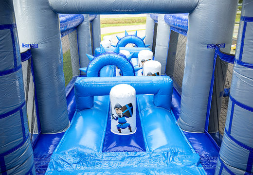Buy an inflatable castle themed obstacle course with 7 game elements and colorful objects for children. Order inflatable obstacle courses now online at JB Inflatables UK