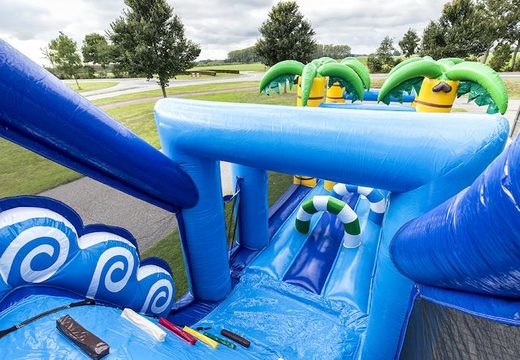 Order a 17 meter wide inflatable obstacle course in the surf theme for children. Buy inflatable obstacle courses online now at JB Inflatables UK