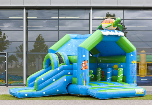 Order covered multifun bouncy castle with slide in turtle theme with 3D object at the top for both young and older children. Buy inflatable bouncy castles online at JB Inflatables UK