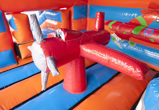 Buy an inflatable multifun bouncy castle for children  in an airplane theme with a roof, various obstacles, a slide and a 3D object on the roof at JB Inflatables UK. Order bouncy castles online at JB Inflatables UK