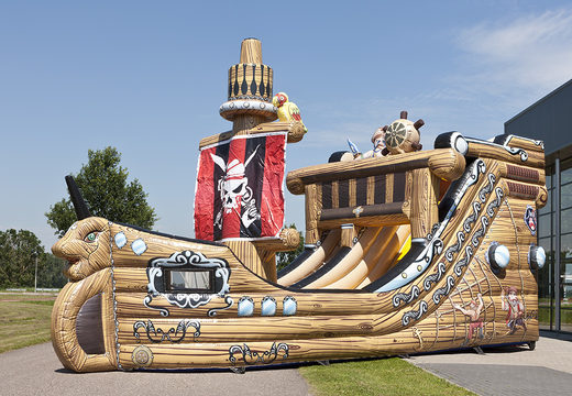 Get a pirate ship themed inflatable slide in an eye-catching shape with cool 3D objects and full color prints for kids. Order inflatable slides now online at JB Inflatables UK