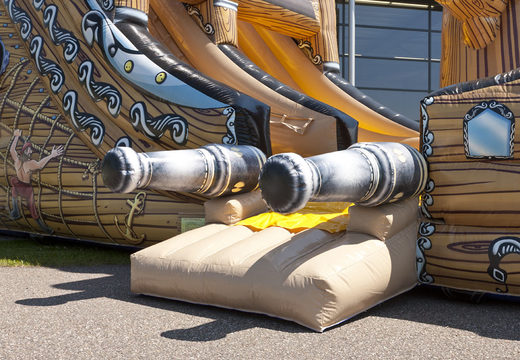 Spectacular inflatable slide with a pirate ship theme, a striking shape with cool 3D objects and full color prints for children. Buy inflatable slides now online at JB Inflatables UK