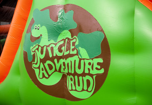 Jungle run 17m obstacle course with 7 game elements and colorful objects for kids. Buy inflatable obstacle courses online now at JB Inflatables UK
