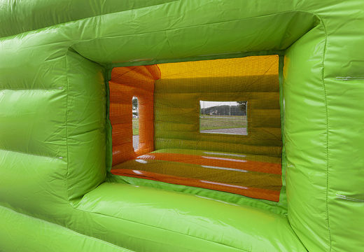 Order covered maxi multifun bounce house in jungle theme with a slide for children. Buy bounce houses online at JB Inflatables UK