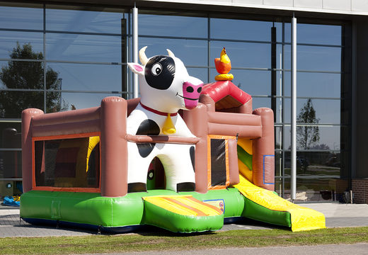 Buy medium-sized inflatable farm multiplay bouncy castle with a slide, fun objects on the jumping surface and eye-catching 3D objects for kids. Order inflatable bouncy castles online at JB Inflatables UK