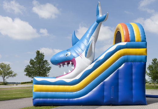 Multifunctional shark-themed inflatable slide with a splash pool, impressive 3D object, fresh colors and the 3D obstacles for kids. Order inflatable slides now online at JB Inflatables UK