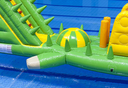 Crocodile run 12m long inflatable obstacle course with challenging obstacle objects for both young and old. Order inflatable water attractions now online at JB Inflatables UK