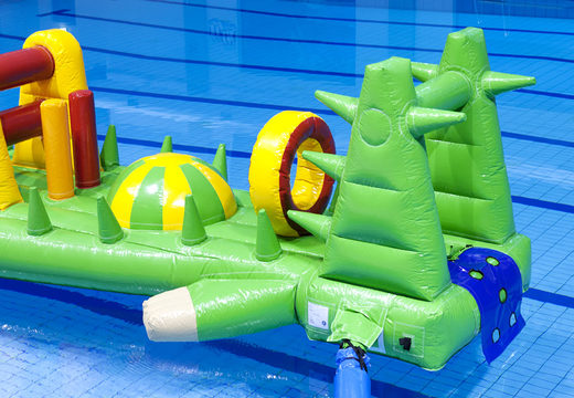 Spectacular inflatable crocodile run 12 m swimming pool with challenging obstacle objects for both young and old. Buy inflatable water attractions online now at JB Inflatables UK