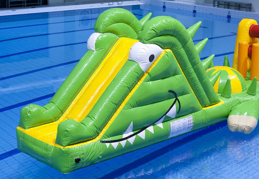 Crocodile run 12 meter long swimming pool with challenging obstacle objects for both young and old. Order inflatable pool games now online at JB Inflatables UK