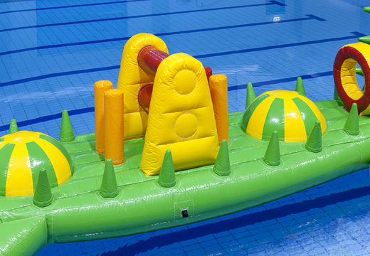 Buy inflatable swimming pool run crocodile 12 meters with challenging obstacle objects for both young and old. Order inflatable obstacle courses online now at JB Inflatables UK