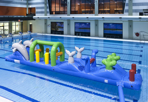Buy dolphin themed airtight swimming pool run with challenging obstacle objects for kids. Order inflatable obstacle courses online now at JB Inflatables UK