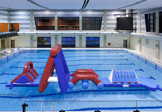 Buy an inflatable Water obstacle run strom course with two climbing walls, a balancing object, a pendulum tower and a slide for both young and old. Order inflatable water attractions now online at JB Inflatables UK