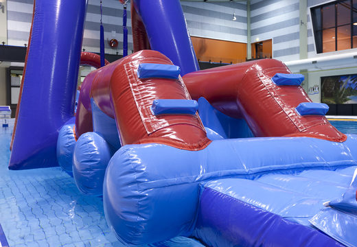 Order Water obstacle run obstacle course with two climbing walls, a balancing object, a pendulum tower and a slide for both young and old. Buy inflatable water attractions online now at JB Inflatables UK