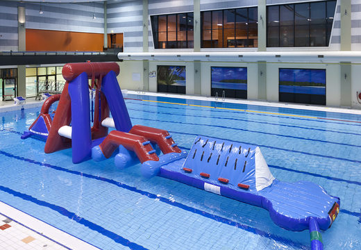 Spectacular inflatable Water obstacle run obstacle course with two climbing walls, a balancing object, a swing tower and a slide for kids. Order inflatable water attractions now online at JB Inflatables UK