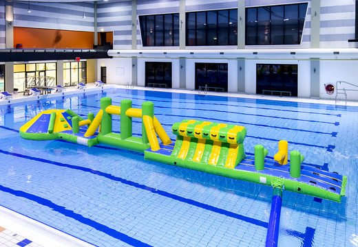 Buy inflatable adventure run green/blue 16m swimming pool with fun objects and round slide for both young and old. Order inflatable pool games now online at JB Inflatables UK