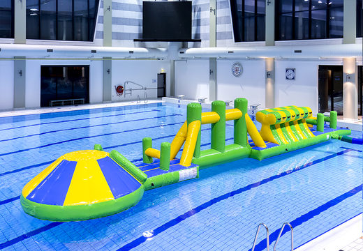 Order swimming pool adventure run green/blue 16m with challenging obstacle objects and round slide for both young and old. Buy inflatable water attractions online now at JB Inflatables UK