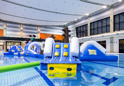 Get an airtight double inflatable 16 meter long pirate run swimming pool obstacle course in a unique design with funny 3D objects and no less than 2 slides for both young and old. Order inflatable obstacle courses online now at JB Inflatables UK