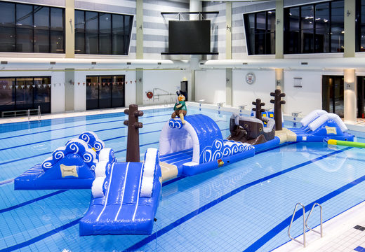 Order double inflatable 16 meter long pirate run swimming pool obstacle course in a unique design with funny 3D objects and no less than 2 slides for kids. Buy inflatable obstacle courses online now at JB Inflatables UK