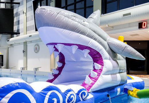 Buy a 13 meter long inflatable shark run obstacle course in a unique design with funny 3D objects and no less than 2 slides for both young and old. Order inflatable pool obstacle courses now online at JB Inflatables UK