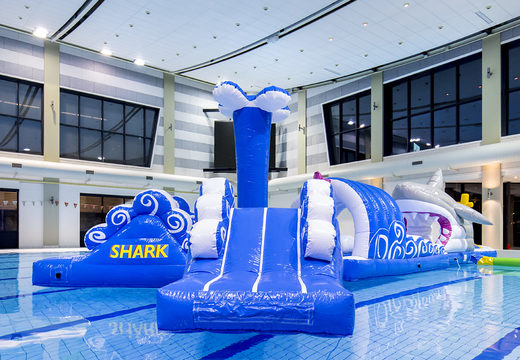 Buy a 13 meter long inflatable shark run assault course in a unique design with funny 3D objects and no less than 2 slides for both young and old. Order inflatable water attractions now online at JB Inflatables UK.