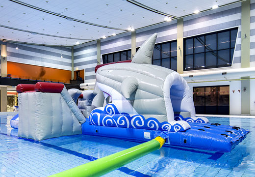Inflatable airtight shark play island with a vine, climbing tower, round slide and obstacles for both young and old. Buy inflatable pool games now online at JB Inflatables UK