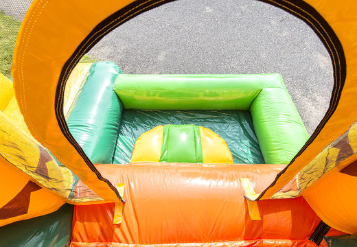 Buy small inflatable bouncer  in jungle theme with slide for children. Order inflatable bouncers online at JB Inflatables UK