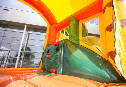 Buy a bouncer in the theme jungle with a slide for children. Order inflatable bouncers online at JB Inflatables UK