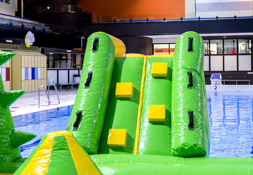 Spectacular crocodile themed play island with a vine, climbing tower, round slide and obstacles for both young and old. Buy inflatable pool games online now at JB Inflatables UK