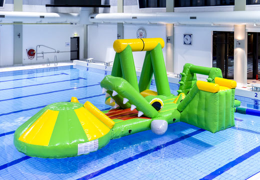 Order an inflatable airtight crocodile play island with a vine, climbing tower, round slide and obstacles for both young and old. Buy inflatable water attractions online now at JB Inflatables UK