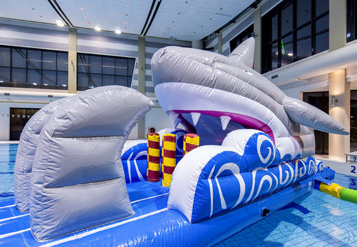 Buy an airtight shark-themed slide for both young and old. Order inflatable water attractions now online at JB Inflatables UK