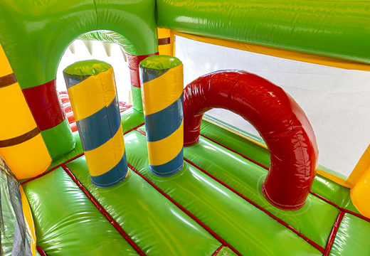 Multiplay crocodile bounce house with 3D objects inside and a slide for kids. Buy inflatable bounce houses online at JB Inflatables UK