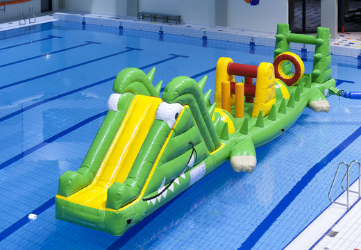 Order 12 meter long inflatable swimming pool run crocodile with challenging obstacle objects for both young and old. Buy inflatable obstacle courses online now at JB Inflatables UK