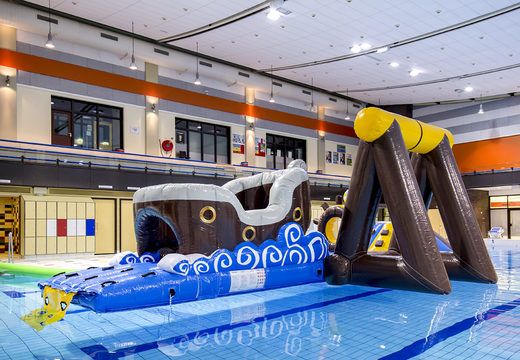 Airtight inflatable pirate play island with a vine, climbing tower, round slide and obstacles for both young and old. Order inflatable water attractions now online at JB Inflatables UK