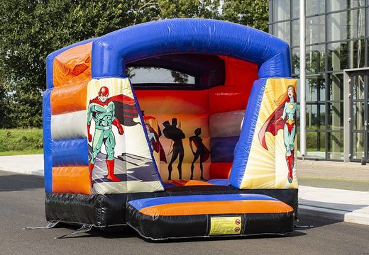 Small inflatable bouncer with roof in superhero theme blue and orange for sale. Buy bouncers at JB Inflatables UK online 