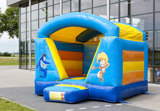 Mini-roofed bouncy castle in blue and yellow seaworld theme for kids to buy. Order bouncy castles now at JB Inflatables UK online
