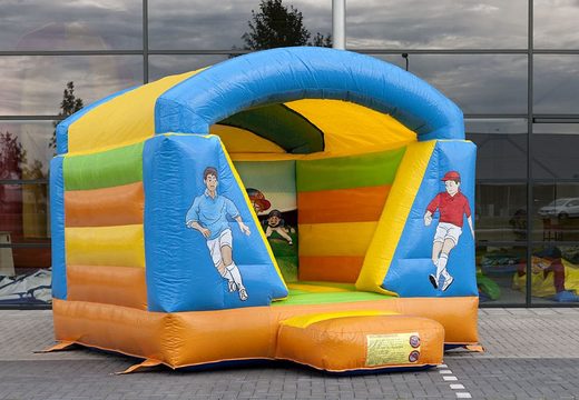 Small bounce house with roof for kids to buy in a colour combination of blue yellow green and orange and in football theme. Buy bounce houses online at JB Inflatables UK
