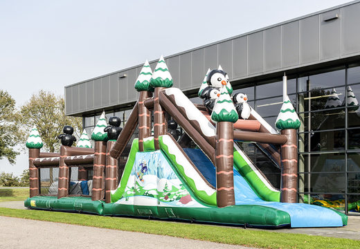 Winter run 17m obstacle course with 7 game elements and colorful objects for kids. Buy inflatable obstacle courses online now at JB Inflatables UK