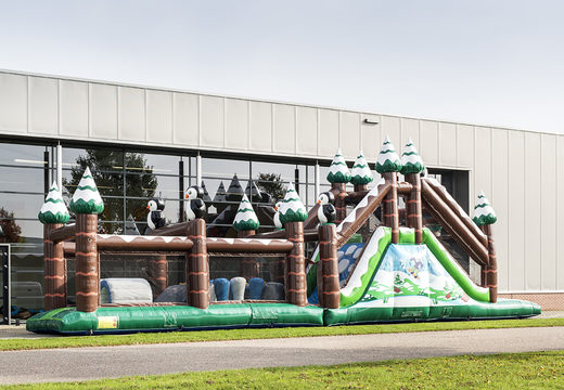 Buy inflatable unique 17 meter wide obstacle course in winter theme with 7 game elements and colorful objects for children. Order inflatable obstacle courses now online at JB Inflatables UK