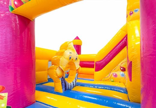 Funcity party bouncy castle with a slide on the inside, the 3D object on the jumping surface and fun party design for kids. Order bouncy castles online at JB Inflatables UK