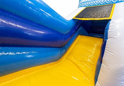 Blue princess themed bounce house with a slide, buy the 3D object on the jumping surface and a fun pirate design for children. Buy bounce houses online at JB Inflatables UK