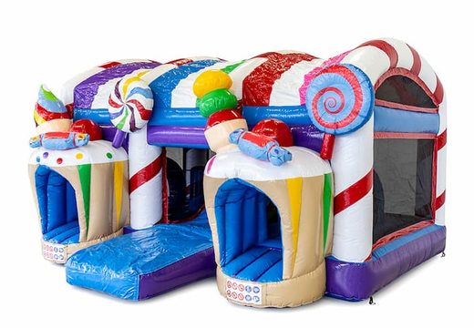 Buy large inflatable indoor multiplay xxl bouncy castle with slide in candyland theme for children. Order bouncy castles online at JB Inflatables UK