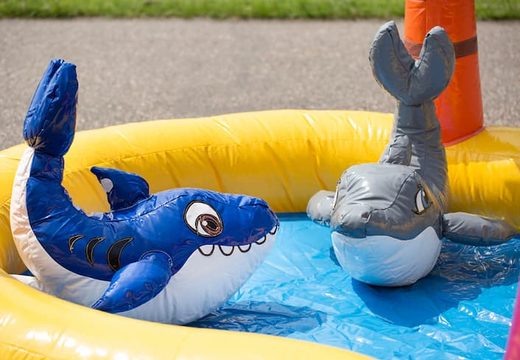 Buy a semi-open playzone seaworld bounce house with plastic balls and 3D objects for children. Order bounce houses online at JB Inflatables UK